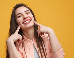 Lady shows off pretty smile?